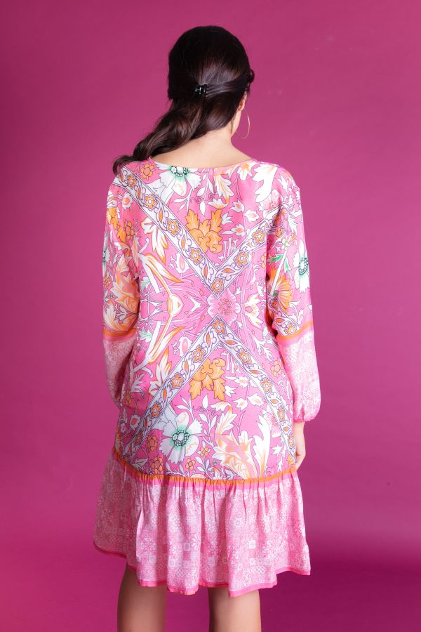 Frilled dress with ornaments