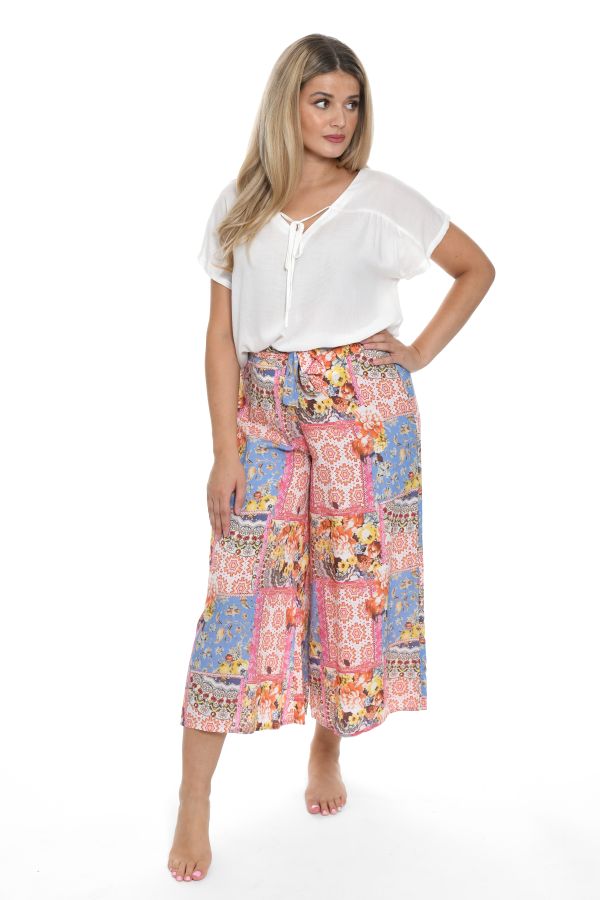 Wide trousers with patchworkprint in pastel colors